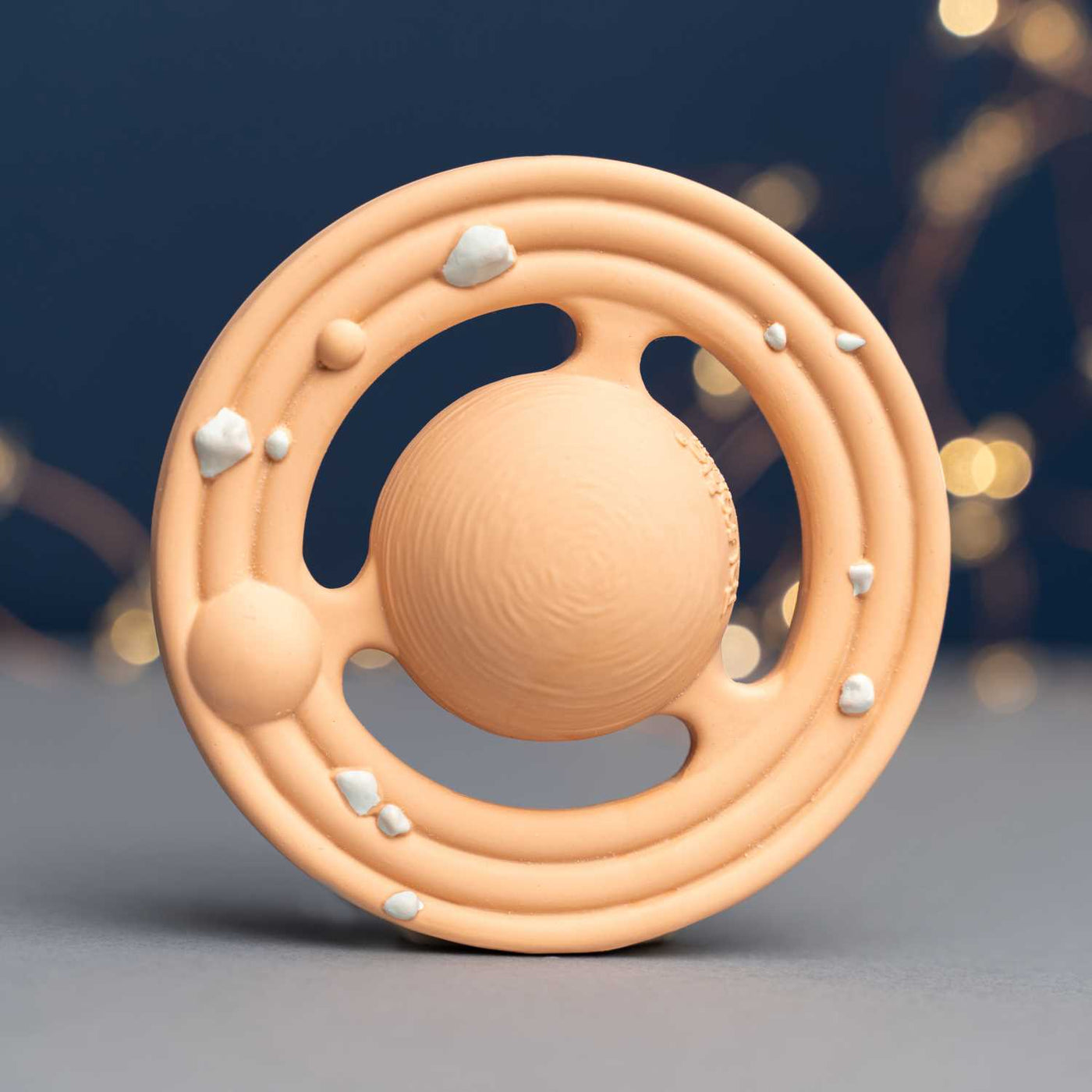 Peach Planet CH3W planet shaped teether with life like rocks to soothe sore teething gums